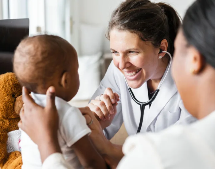 Doctor with infant
